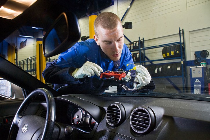 Polymer resin repair of rock chip costs about $70