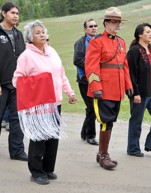 Staff Sgt. Marko Shehovac of the Columbia Valley detachment of the Royal Canadian Mounted Police takes plart in the opening ceremonies at National Aboriginal Day.