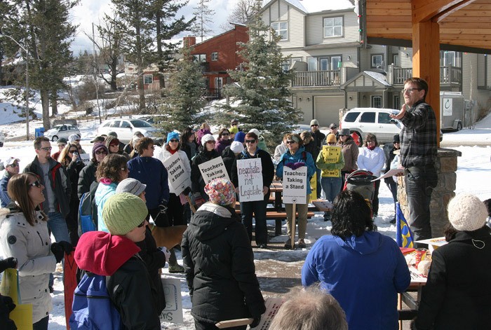 Doug Murray addresses a crowd of teachers at a rally March 6.