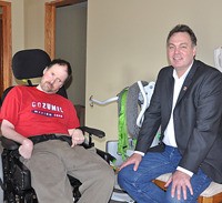MLA Norm Macdonald (right) dropped by to wish Norm Gagatek a happy homecoming.