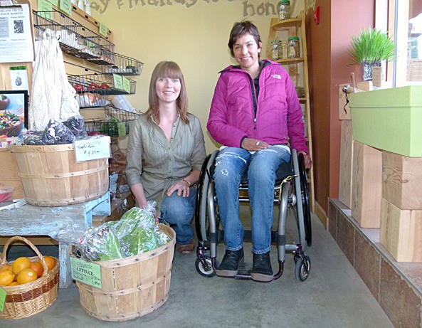 Sarah Bourke (left) and Spring Hawes (right) in the produce section of Spring Health Foods in Invermere. Bourke will become the new operator of the store over the course of the next few months.