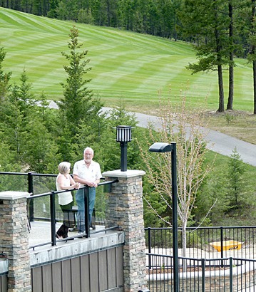 Two guests admire the view at Copper Point Resort.