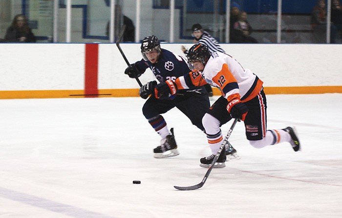 Rockies forward Cody Stephenson nearly gets a breakaway during the Rockies 8-2 loss to Creston.