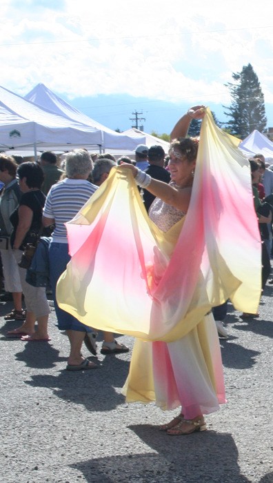 A member of the local belly dancing group Arabian Mountain Spice captivates a crowd.