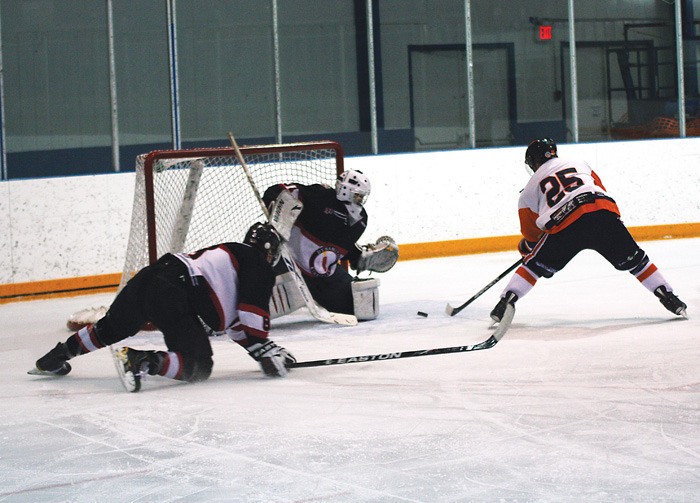 Forward Joe Colborne makes a great move to get past a defender and gets a quality scoring chance during the Rockies 5-0 loss to the Kimberley Dynamiters December 3.