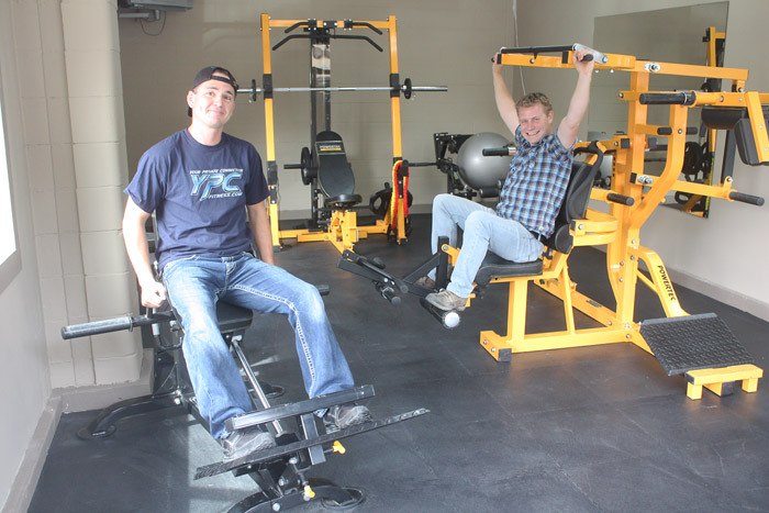 Darryl Stettler (left) and Gerry's Gelati owner Gerry Taft show off some of the brand new equipment at YPC Fitness in Radium.