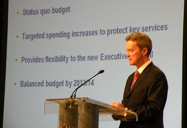 Finance Minister Colin Hansen presents his 2011 budget in Victoria Tuesday. A new budget won't be adopted until a new premier takes office in early March.