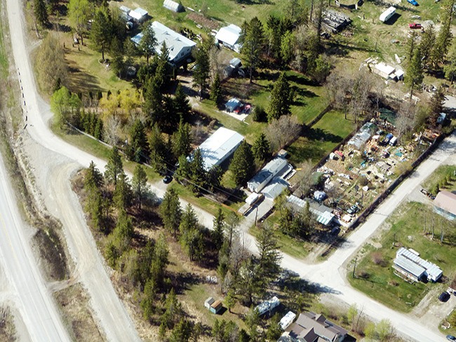 An aerial shot of Baille Grhoman Avenue in the Village of Canal Flats displays an overview of a few properties on the street.