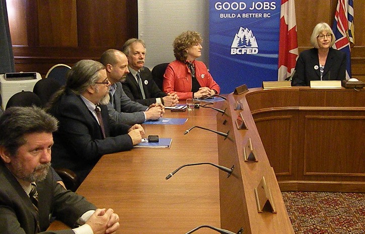 B.C. Federation of Labour president Irene Lanzinger (right) chairs a meeting of B.C. union leaders at the B.C. legislature