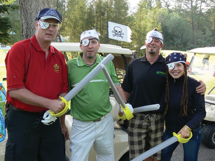 August 2009 — (l-r) Rick Dendy