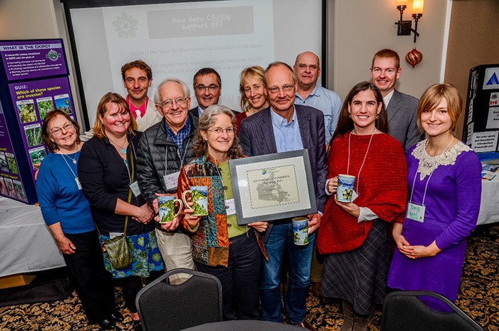 Directors of the Columbia Basin Environmental Education Network present Columbia Basin Trust with the 2014 Award of Excellence in Environmental Education and Communication. In photo back (left to right) Susie MacDonald