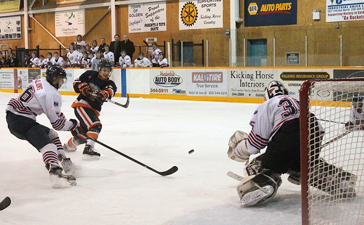 Doan Smith blasts a shot from the slot during three-on-three overtime to give the Rockies a 6 – 5 win over the Golden Rockets