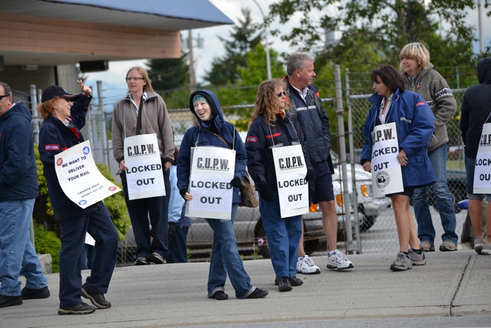 Locked out postal workers in South Surrey Wednesday.