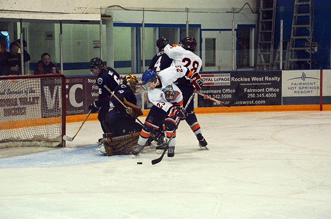 Crashing the crease results in a goal for the Rockies in an exhibition game at home against the Creston Valley Thunder Cats on Thursday