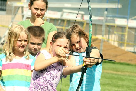Kids take aim at Rocky Mountain Sports Camp.