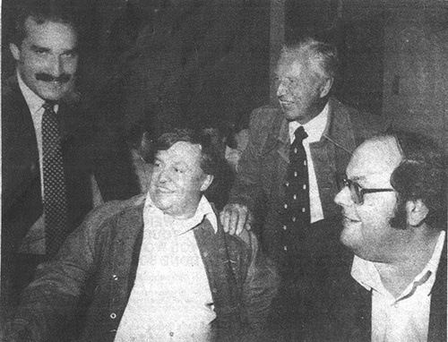 file photo Eddie Mountain (seated left) was a big influence on the Invermere sports scene for many years. He is pictured here at a sports dinner with John Davidson (standing left)