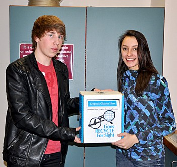 Blake Beggs (left) and Elizabeth Arif (right) work with the Lake Windermere Lions Club to collect glasses and sunglasses for the Lions Recycle for Sight program.