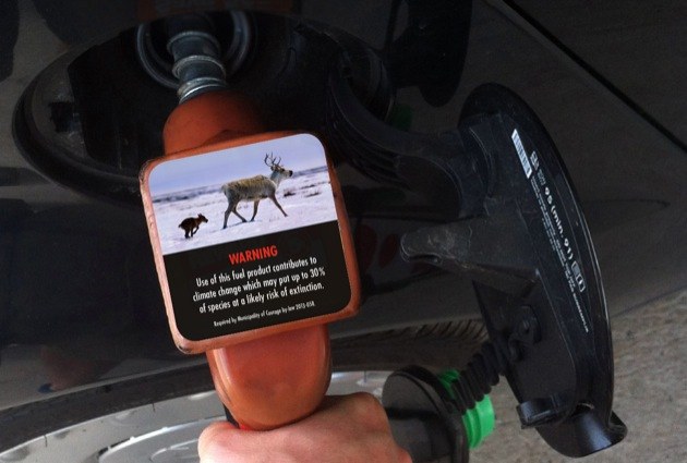 An advocacy group and a growing number of municipal politicians are pushing for the addition of climate change warning labels on gas pump handles.
