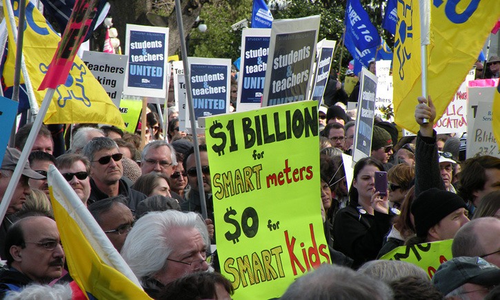 Striking teachers are joined by other union members and NDP MLAs in a rally at the B.C. legislature in 2012.