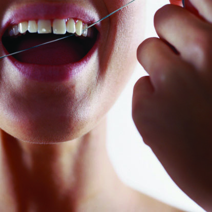 Flossing daily--Many dentists advocate for flossing