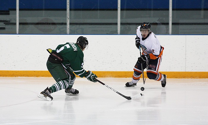 Rockies forward Racey Red Crow (#8) makes a move to get by a defender during the Rockies 4-3 overtime loss to Nelson on November 18.