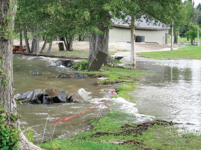 Restoration work done to the shoreline at Kinsmen Beach helped decrease erosion during the flooding that occurred earlier in the summer.