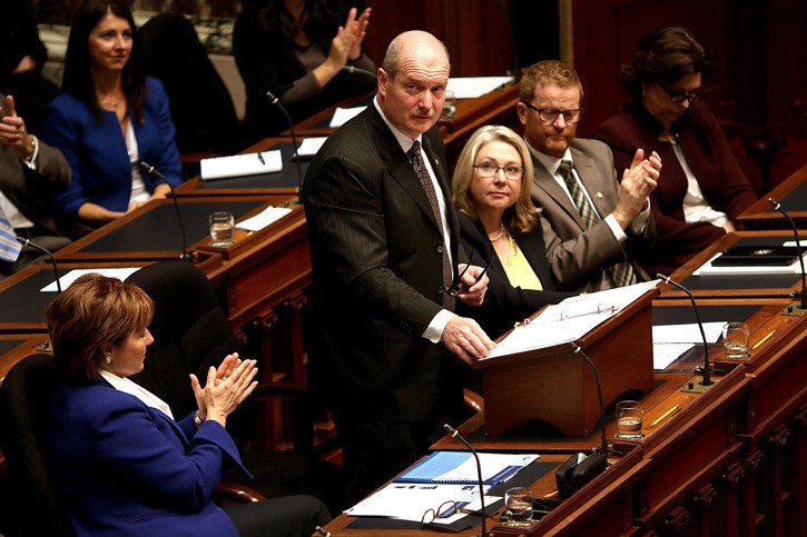 Premier Christy Clark and Finance Minister Mike de Jong have reversed their position on health care premiums.