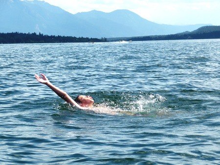 Ethan Eivinsen swimming across Lake Windermere.