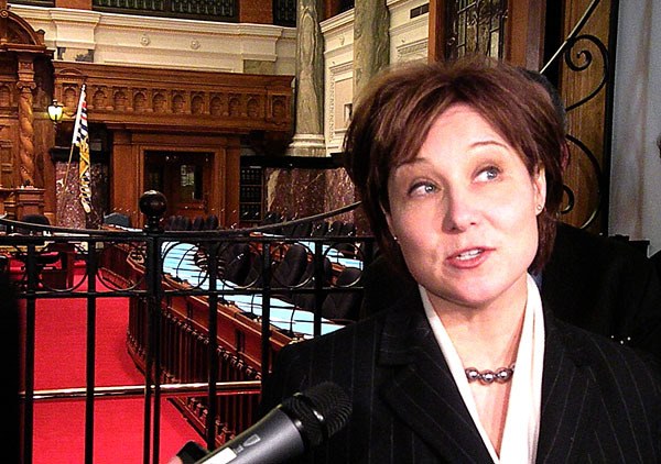 Premier-designate Christy Clark takes questions at the B.C. legislature Monday.