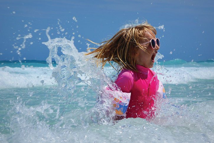 Girl playing in water