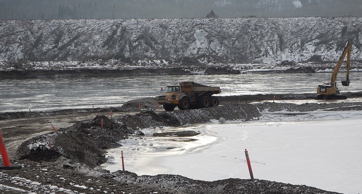 Construction in the Peace River bed began last winter