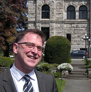 Vancouver-Kingsway MLA Adrian Dix stands outside the premier's office at the B.C. legislature