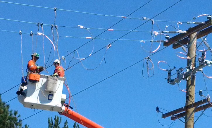 BC Hydro crew at work: the recent cold spell has included wind and ice-related power outages around the province.