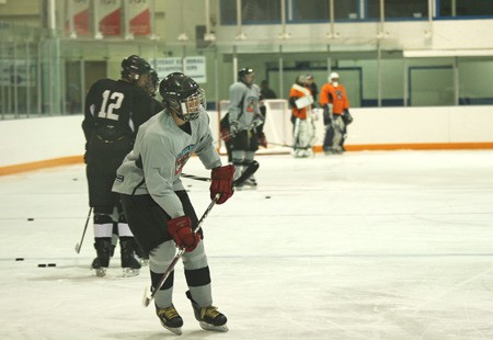 Players practicing at the Columbia Valley Rockies hockey camp.