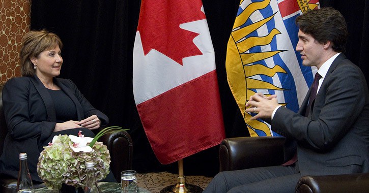 Premier Christy Clark meets with Prime Minister Justin Trudeau at the Paris climate summit last year. Both have been accused of a lack of follow-up since then.