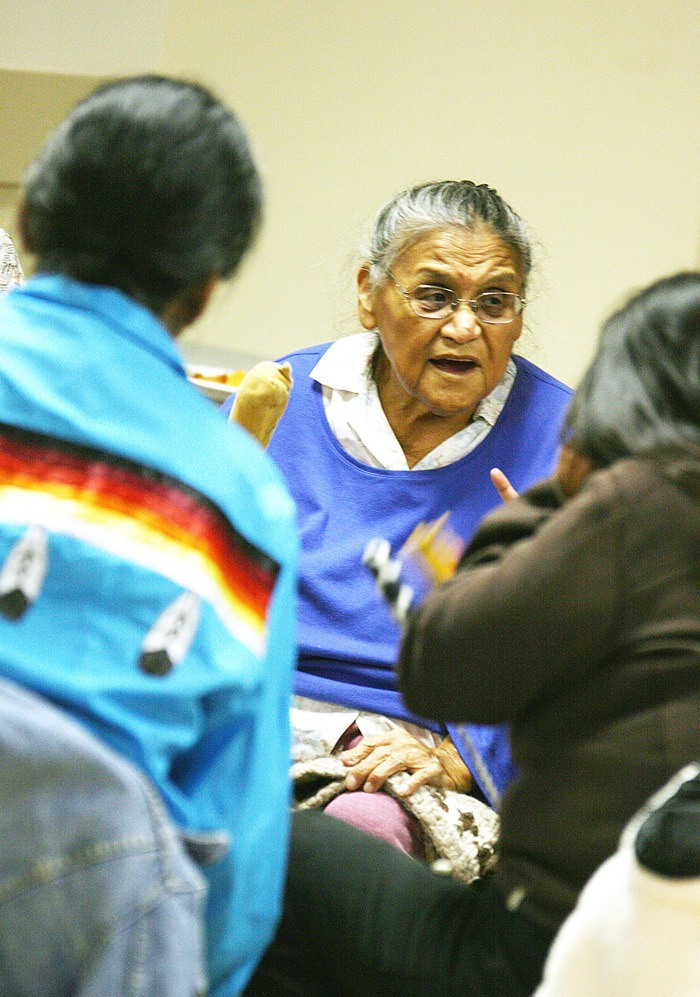 A member of the Sookenai Singers Drum Group performs at the Akisqnuk Band Hall in November 2011 during a one year anniversary celebration of the Qat'muk Declaration and the Ktunaxa First Nation's opposition to the development of a resort in the Jumbo Valley.