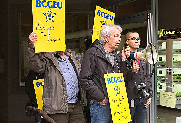 Dozens of Ministry of Children and Family Development employees are rallying in Vancouver