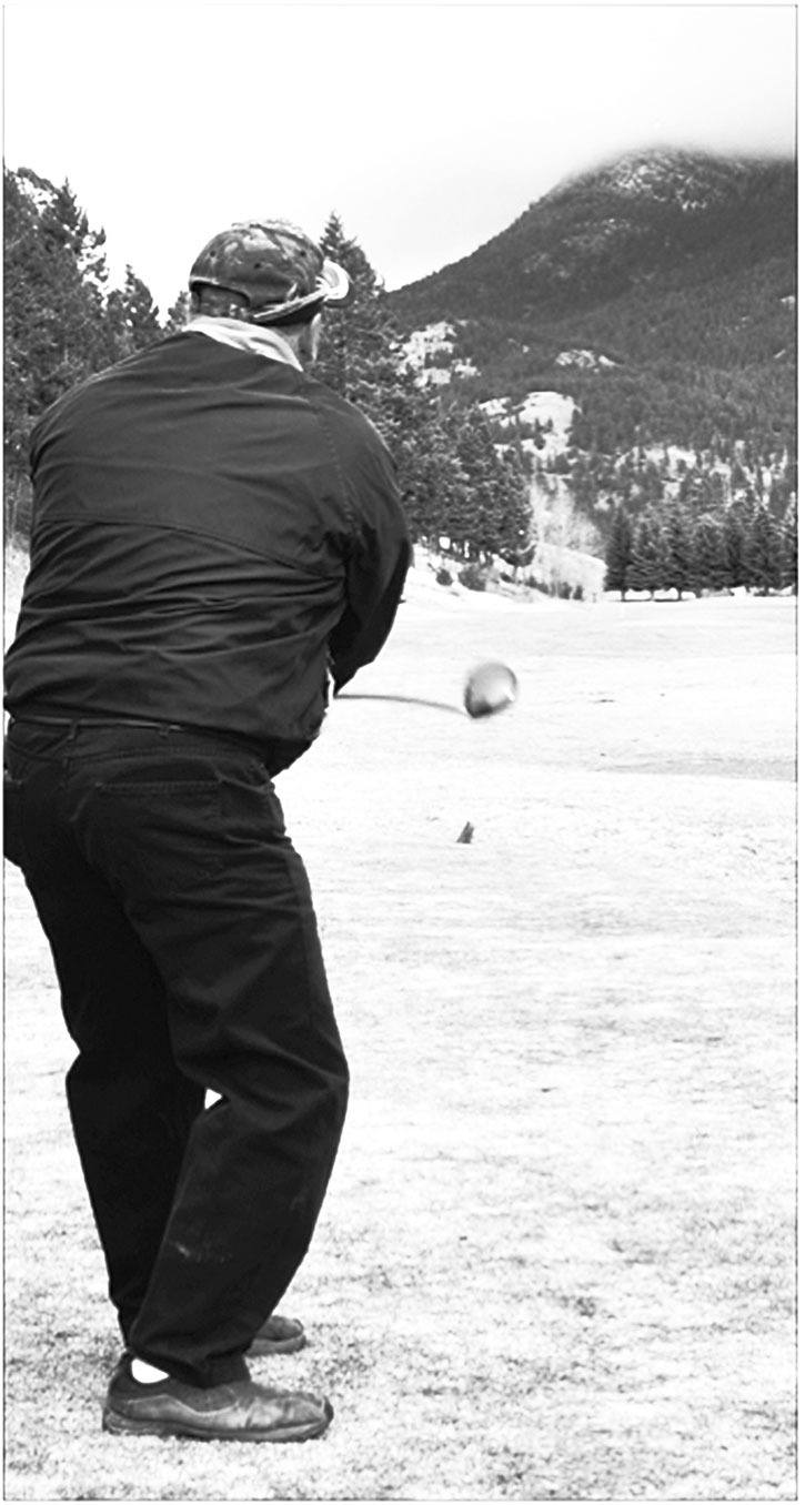 2010 — Larry Logan tees off on the first day of the season for the Windermere Valley Golf Course. Larry