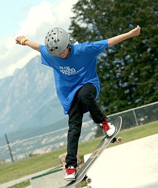 A skater takes a jump during the Ride for CrisQo skateboarding competition.