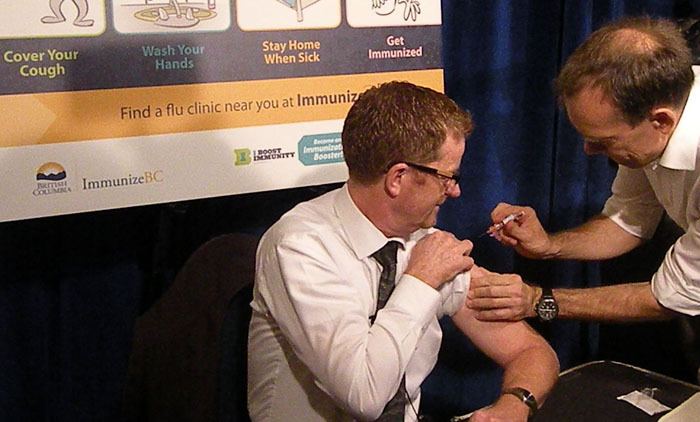 Health Minister Terry Lake gets his annual flu shot