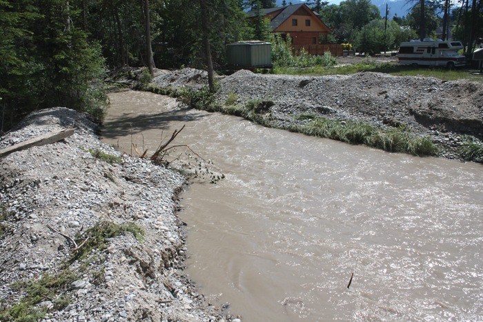 A large quantity of gravel has already been excavated from the creek bed