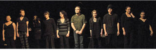 Students from the DTSS drama club stand together at the end of an emotional performance of Bang Bang