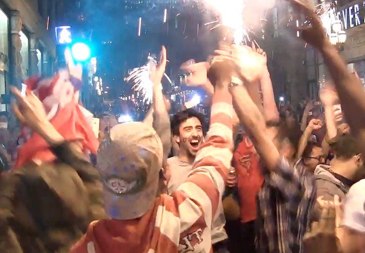 Montreal Canadiens fans celebrate their team's win over the Boston Bruins