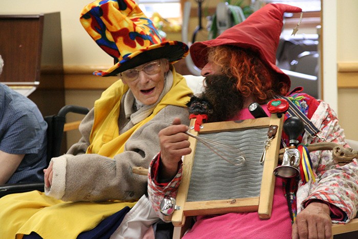 October 2007 — Rolf Heer and his band of merrymen brought some Oktoberfest cheer to Trudy Jorgensen and the other residents of Columbia House Long Term Care Facility.