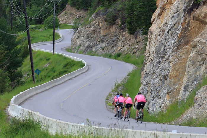 Riders wanting to hitch a ride make their way along a flat stretch of the 100-kilometre circuit in last year's Branch Out Bike Tour.
