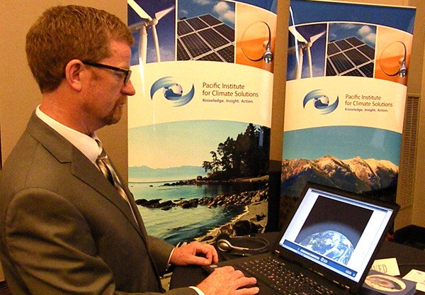 Environment Minister Terry Lake watches an animated climate change course created for B.C. public servants. See sidebar story below for a link to samples of the course