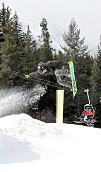 A snowboarder competing in the Easy Rider Cup competition at Panorama Mountain Village in 2010.