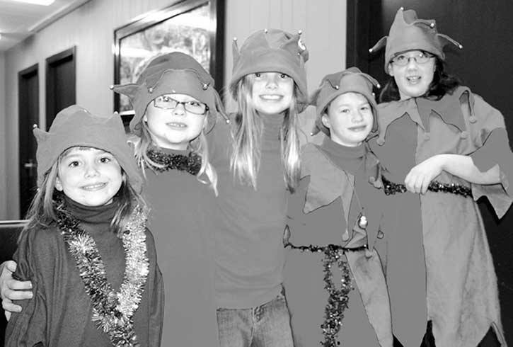 2007 — A group of Christmas Elves cheerfully seold Chrismas gifts at the Elf Craft Sale at the Invermere Community Hall