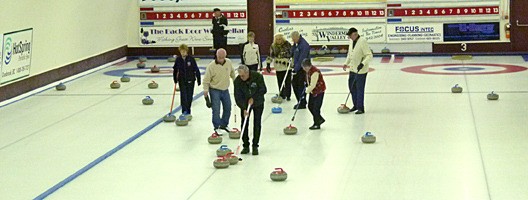 Players bring the rocks back to the other side of the rink during the Senior's Bocche Curling event held at the Invermere Curling Club on the last day of what has been a very succesful curling season. in Invermere.