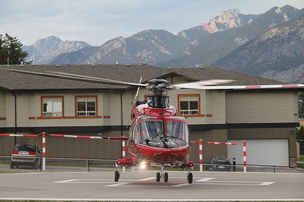 A STARS helicopter carrying the young child rescued from Dutch Creek south of Fairmont leaves the Invermere & District Hospital helipad on Wednesday